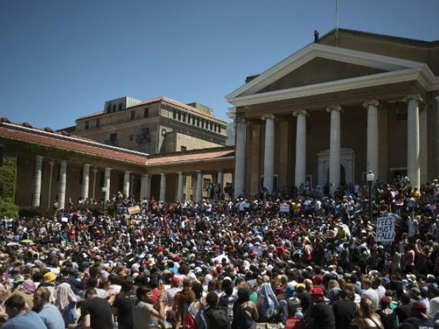 Thousands of students converged at the University of Cape Town in October 2015 for a meeting about ongoing protests against fee hikes by students from various tertiary education institutions around the city. Photo: AFP/RODGER BOSCH